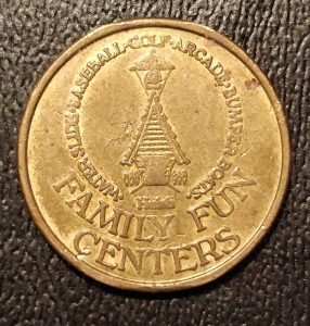 Huish Family Fun Centers: Schoolhouse Logo Slotted Brass